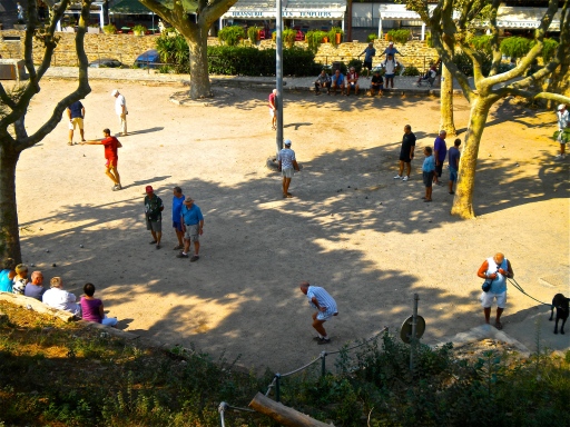 Pétanque courts and players in Collioure, France